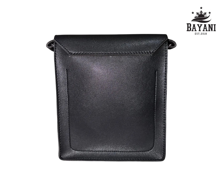 Black leather crossbody bag on a white background with Bayani logo.
