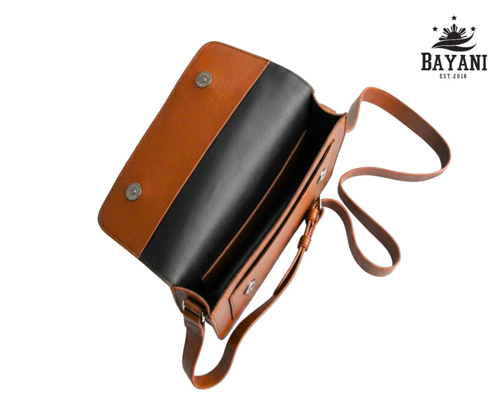 Brown leather crossbody bag with Bayani logo.

