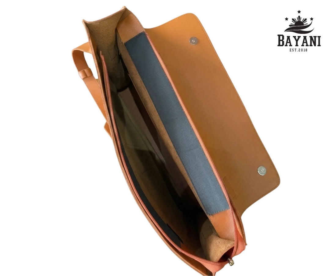 Open tan laptop bag viewed from top
