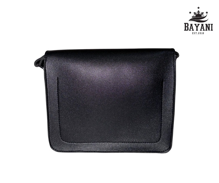 Black leather bag on a white background with Bayani logo.
