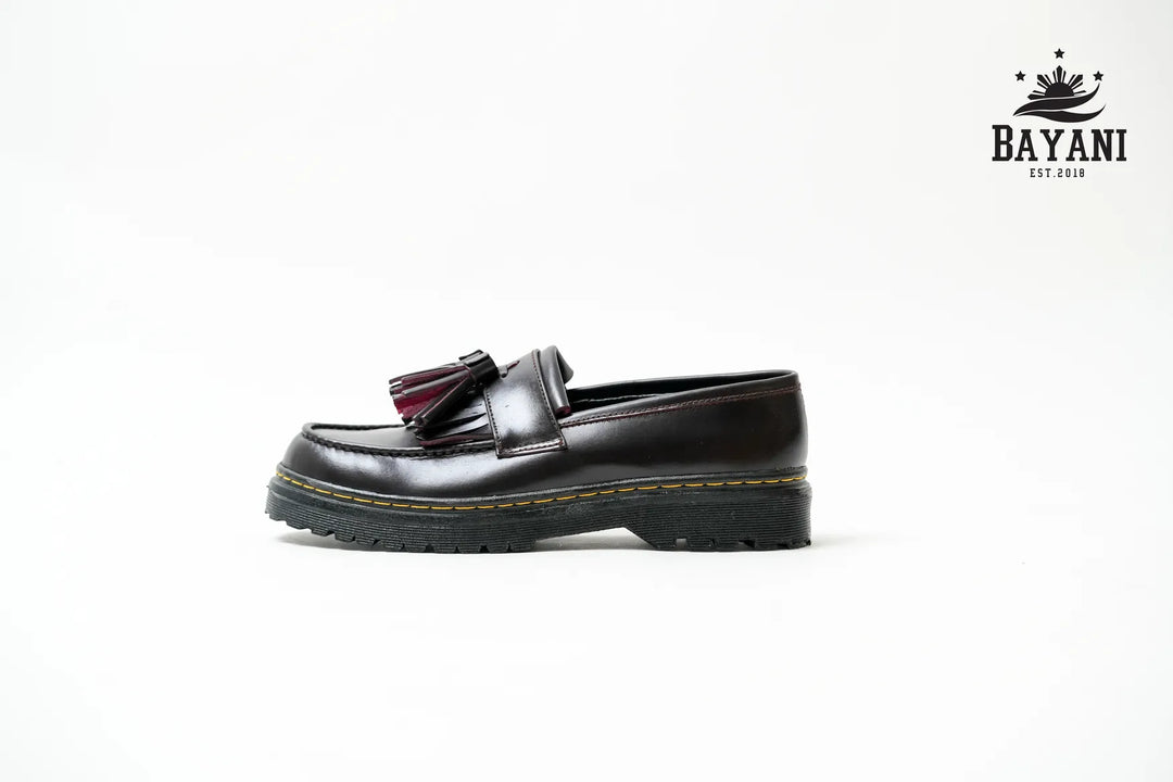 Black loafer shoe with a Bayani logo in the corner on a white background
