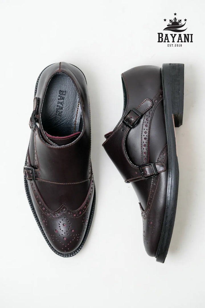 Brown dress shoes with a Bayani logo on a white background
